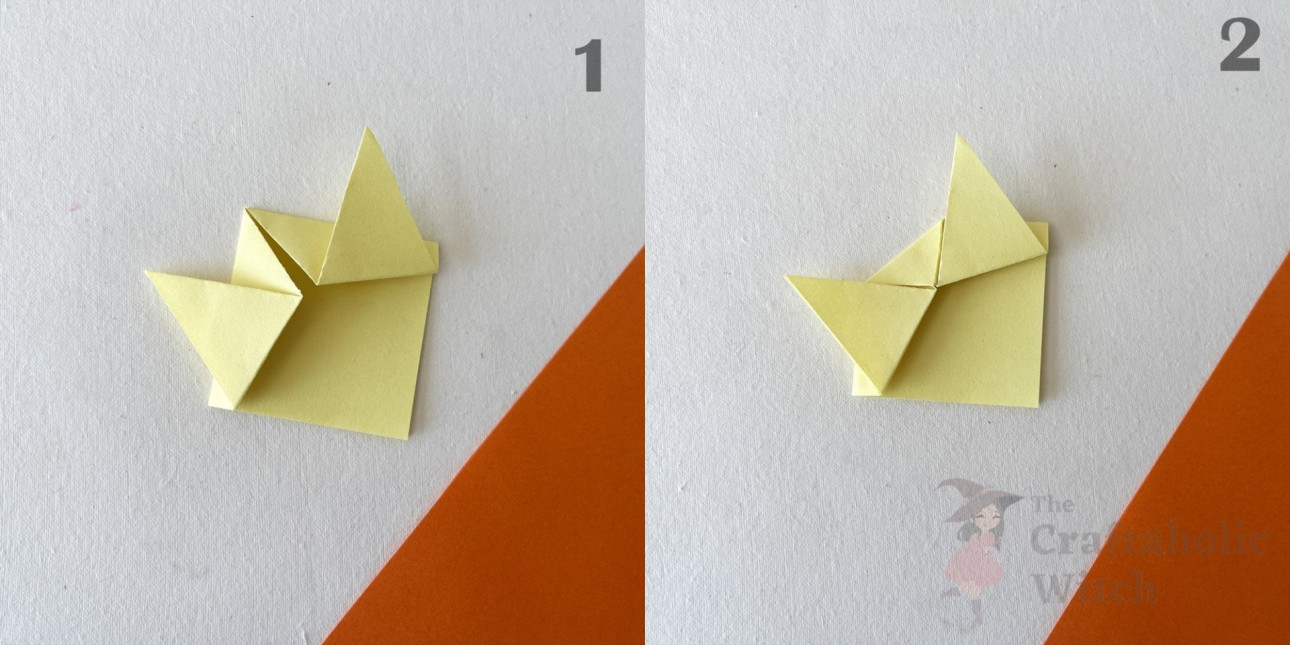 Similarly, fold the left ear. Fold the top corner in half, between the ears.